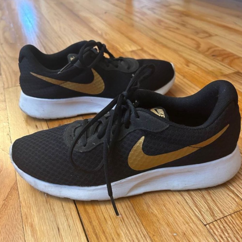 Nike Tanjun Sneakers with Gold Swoosh